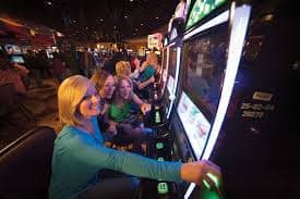 Free Bet Blackjack live dealer studio with croupier and card shoe